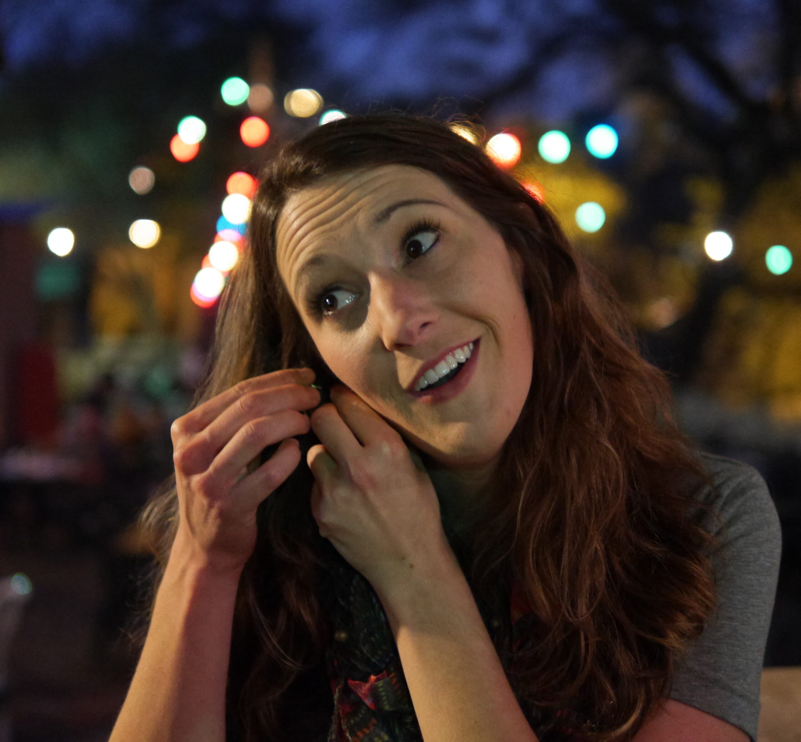 Kat Putting on an Earring