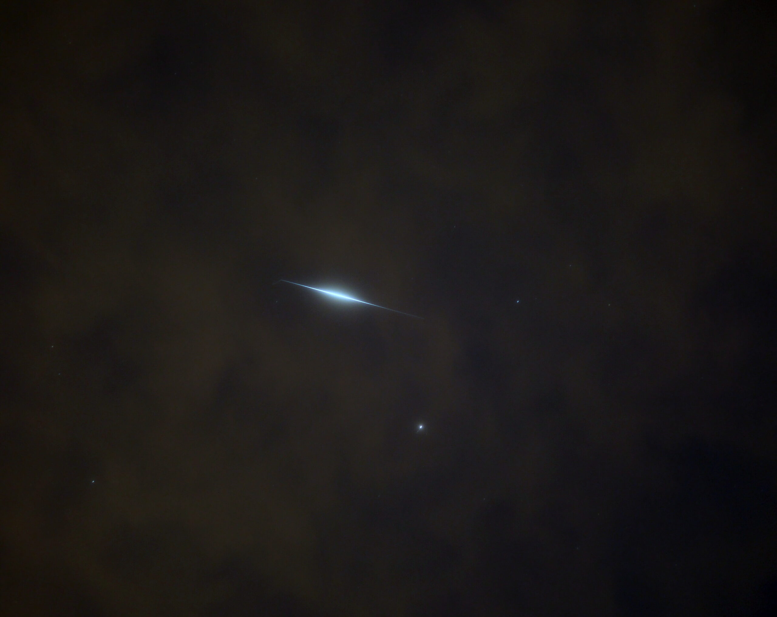 -8.3 Iridium Flare with Light Cloud Cover